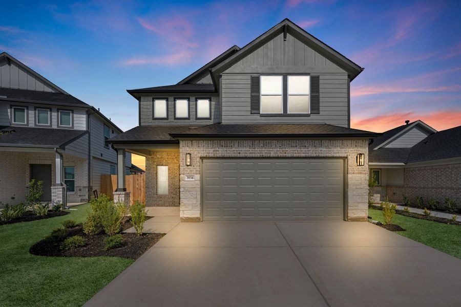 Front exterior of a new home in Grand Oaks Village, Houston, TX, highlighting curb appeal (Image 2). Front exterior of a new home in Grand Oaks Village, Houston, TX, highlighting curb appeal (Image 2).
