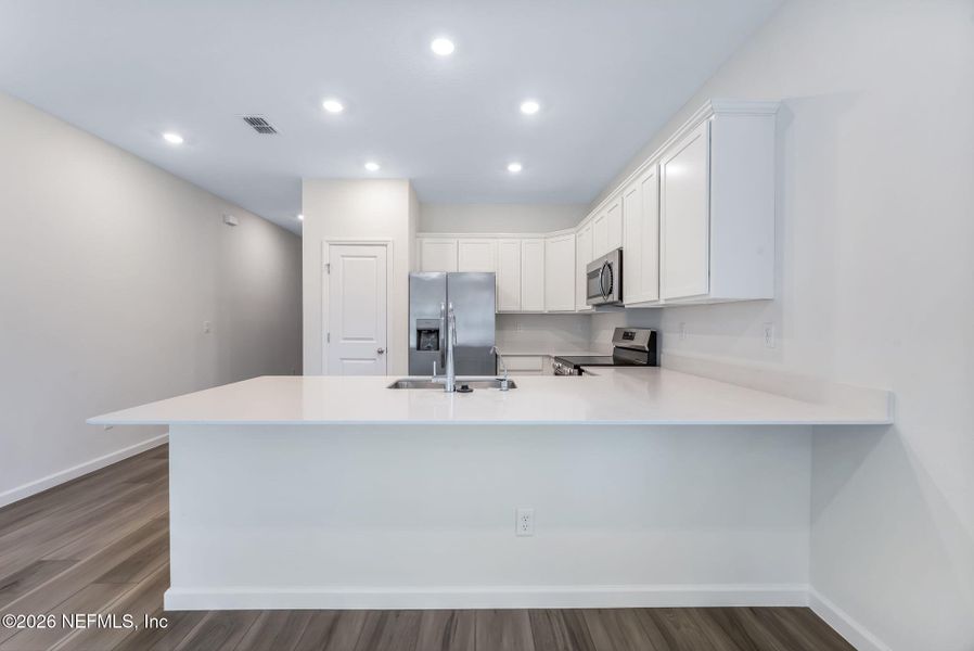 Furnished interior view inside a new home in , Orange Park (Image 9).
