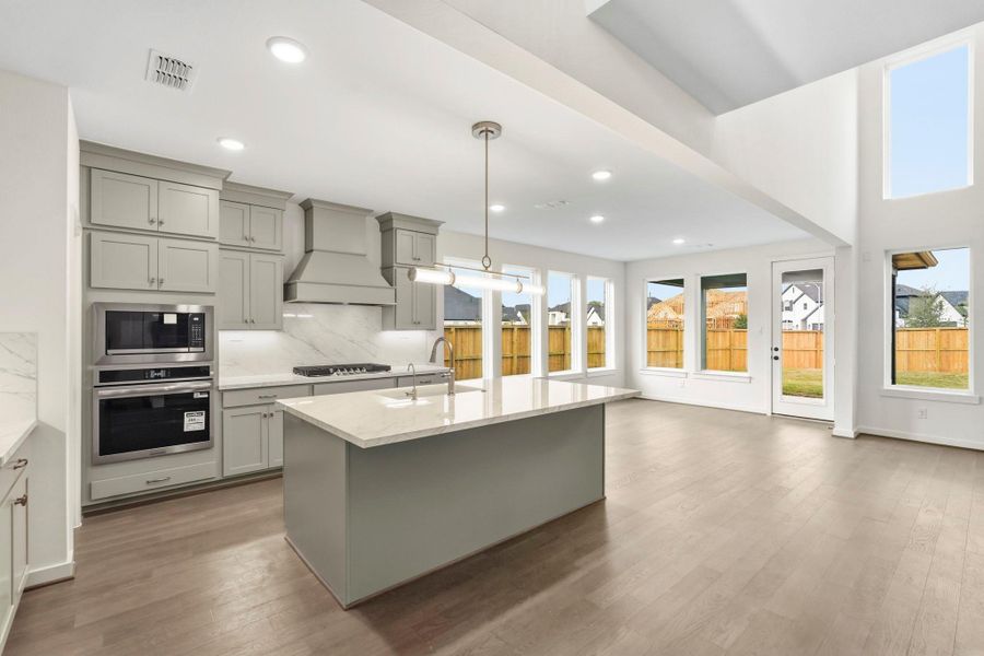 **RENDERING PHOTO OF THE SAME FLOOR PLAN, FINISHES WILL VARY** **RENDERING PHOTO OF THE SAME FLOOR PLAN, FINISHES WILL VARY**