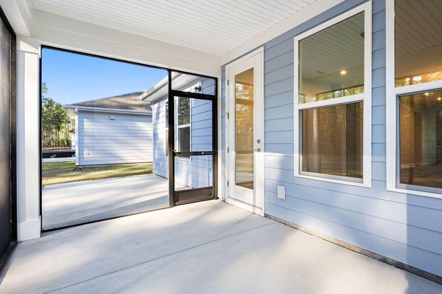 Exterior details and patio area of a home in Sun City Hilton Head, Bluffton (Image 3).