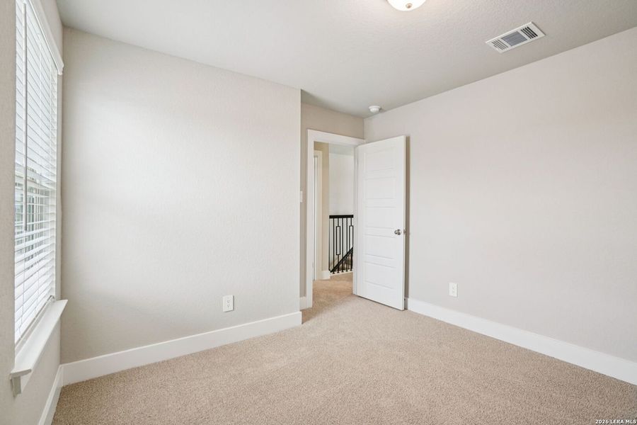 Spacious, unfurnished interior of a new home in Legendary Trails - Premier Series, Cibolo (Image 25).