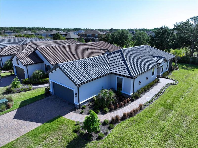 Front exterior of a new home in , Wesley Chapel, FL, highlighting curb appeal (Image 28).