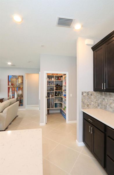 Furnished interior view inside a new home in , Port St. Lucie (Image 41).