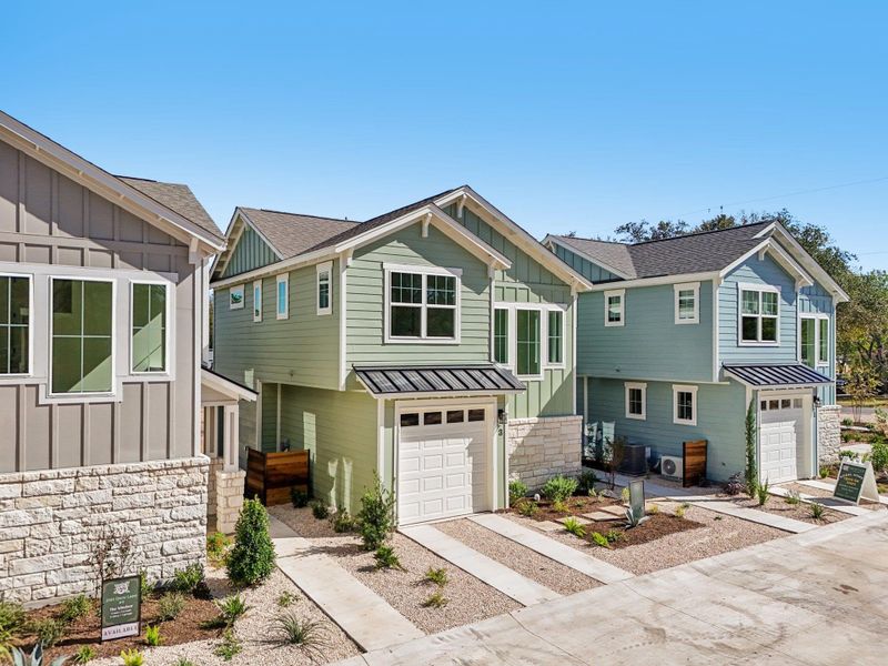 View of front of property with board and batten siding, stone siding View of front of property with board and batten siding, stone siding