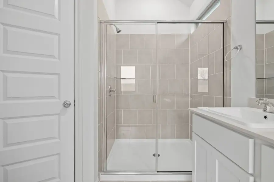Primary Bath in the Birch home plan by Trophy Signature Homes – REPRESENTATIVE PHOTO
