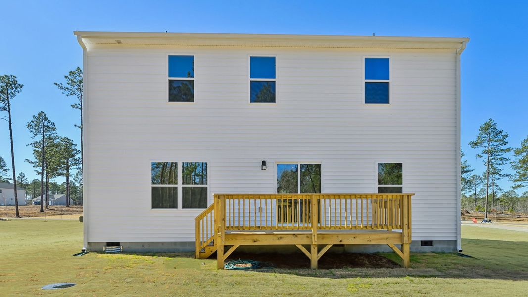 Exterior details and patio area of a home in Gretchen Pines, West End (Image 16).
