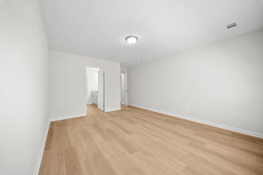 Representative unfurnished interior of a home built from the The Holly by Smith Family Homes in Belair East, Statesboro (Image 20).