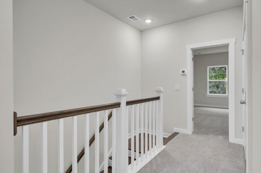 Spacious, unfurnished interior of a new home in Indigo Grove Townhomes, Johns Island (Image 27).