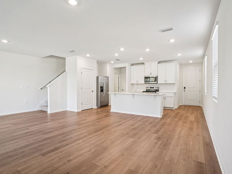 Spacious, unfurnished interior of a new home in The Meadow at Crossprairie Townes, St. Cloud (Image 9).