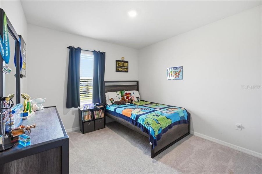 Furnished interior view inside a new home in Coddington, Bradenton (Image 31).