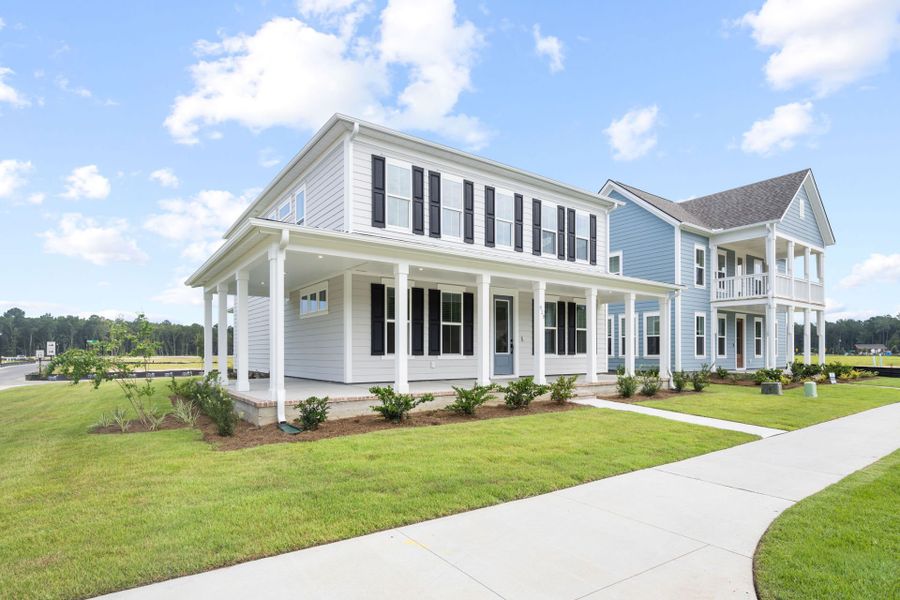 Front exterior of a new home in Heartwood, Richmond Hill, GA, highlighting curb appeal (Image 28).