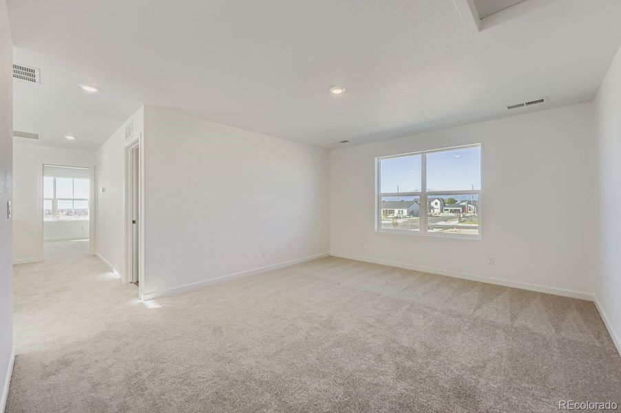 Spacious, unfurnished interior of a new home in Percheron: The Explorer Collection, Colorado Springs (Image 9).