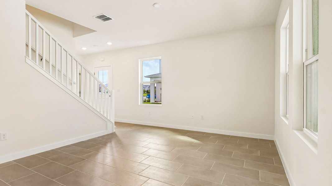 Furnished interior view inside a new home in Cyrene at Harmony, St. Cloud (Image 8).