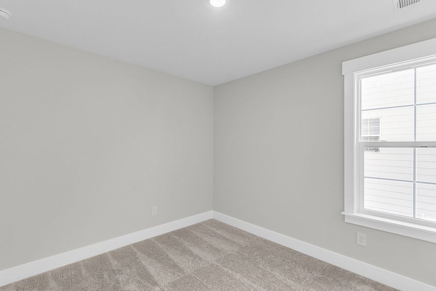 Spacious, unfurnished interior of a new home in Pineland Preserve, Summerville (Image 46).