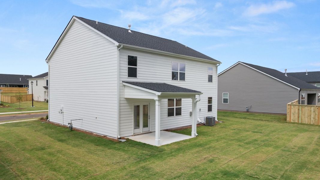Exterior details and patio area of a home in Preserve at Dove Creek, Statham (Image 4). Exterior details and patio area of a home in Preserve at Dove Creek, Statham (Image 4).