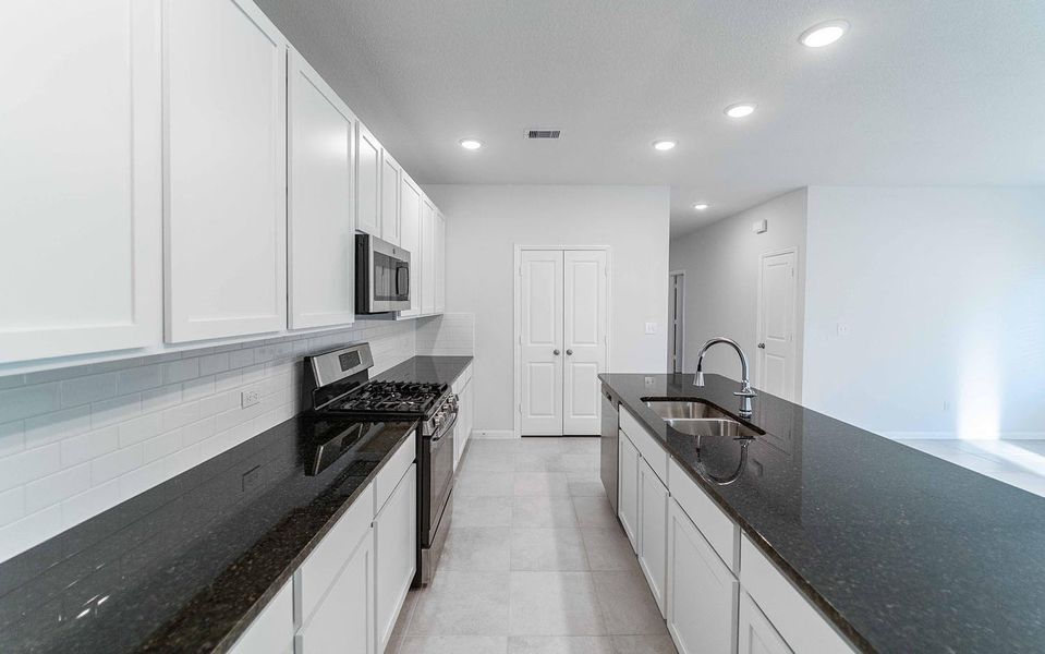 Furnished interior view inside a new home in Cielo, Conroe (Image 7).