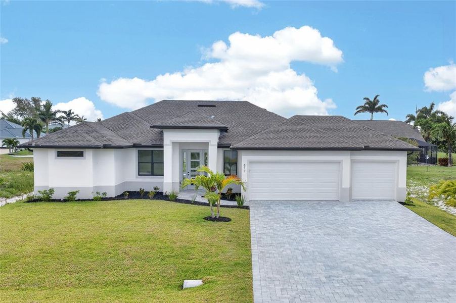 Front exterior of a new home in , Cape Coral, FL, highlighting curb appeal (Image 23).