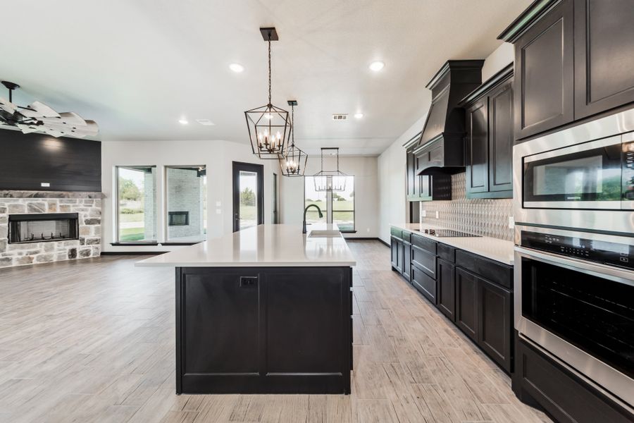 Representative furnished interior of a home built from the The Bennett by Doug Parr Custom Homes in Kessler Farms, Brock (Image 6).