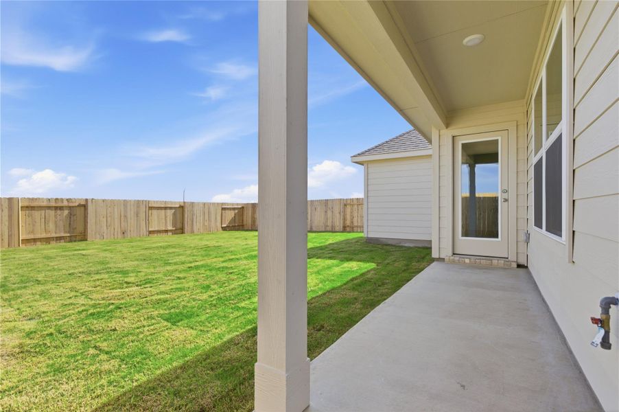 Exterior details and patio area of a home in Infinity Square, Kyle (Image 4).