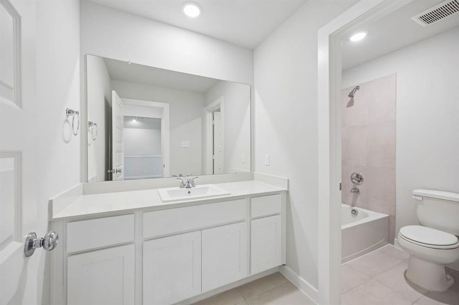 Bathroom in the Mesquite home plan by Trophy Signature Homes – REPRESENTATIVE PHOTO Bathroom in the Mesquite home plan by Trophy Signature Homes – REPRESENTATIVE PHOTO