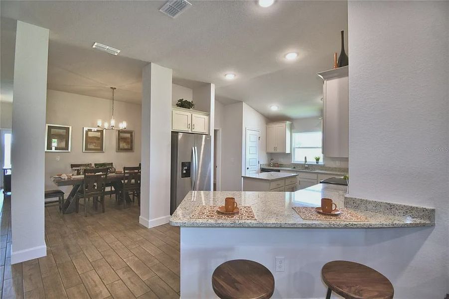 Furnished interior view inside a new home in Magnolia Park, Haines City (Image 14).