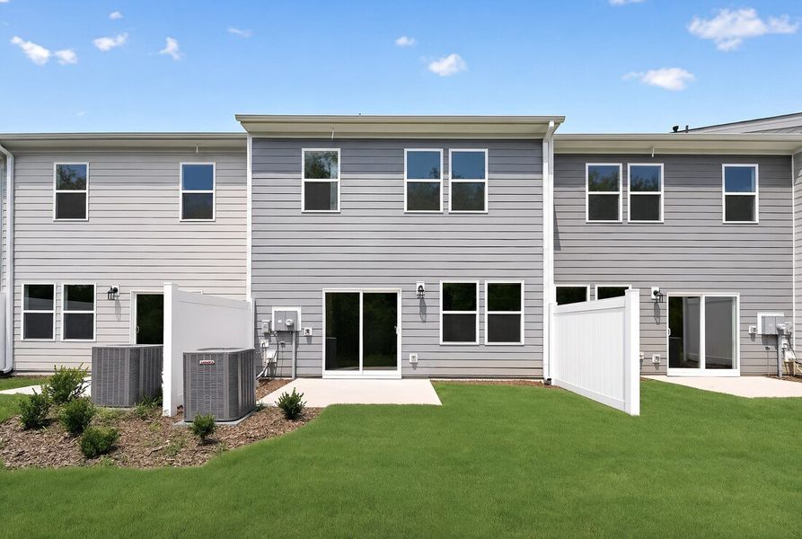 Exterior details and patio area of a home in Magnolia Townes, Wendell (Image 4).