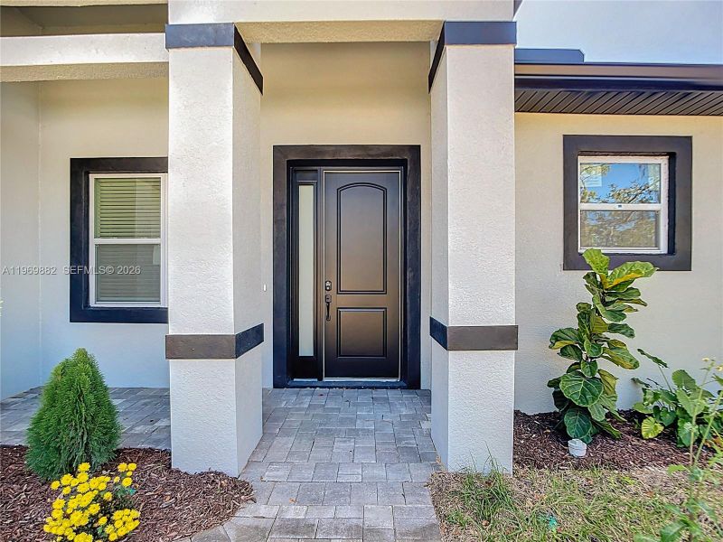Exterior details and patio area of a home in , Port Charlotte (Image 27).