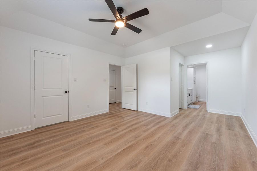 Another view of the primary bedroom.