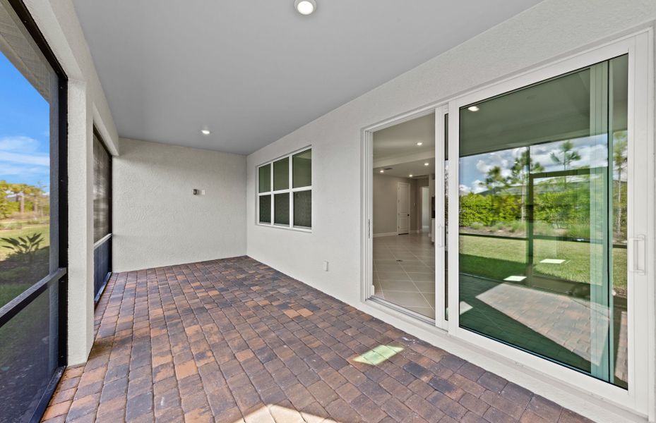 Exterior details and patio area of a home in Del Webb Oak Creek, North Fort Myers (Image 18).
