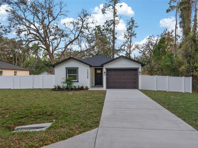Front exterior of a new home in , Brooksville, FL, highlighting curb appeal (Image 28).