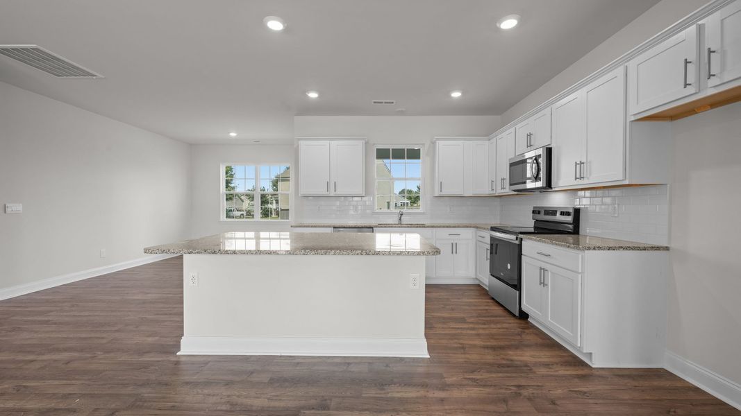 Furnished interior view inside a new home in Tyler - Home on the Lake, New Bern (Image 7).