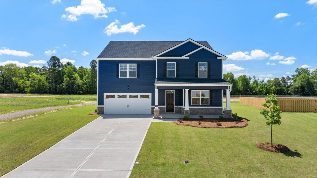 Front exterior of a new home in Southwind Village, Evans, GA, highlighting curb appeal (Image 19).