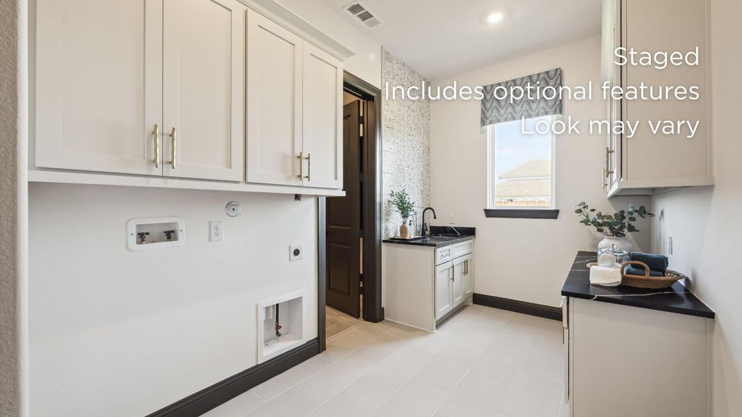 Furnished interior view inside a new home in Woodhavyn 60', Magnolia (Image 12).