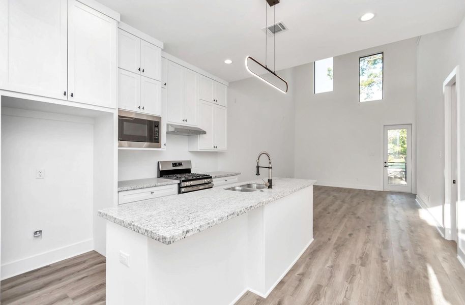 Light and airy kitchen that boasts natural light throughout Light and airy kitchen that boasts natural light throughout