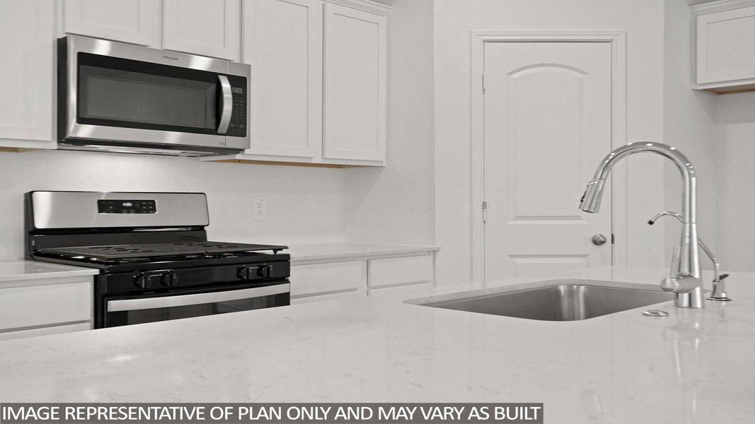 Close-up of interior finishes inside a home in Sunterra, Katy (Image 7).