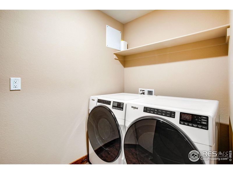 Main level laundry with washer and dryer included