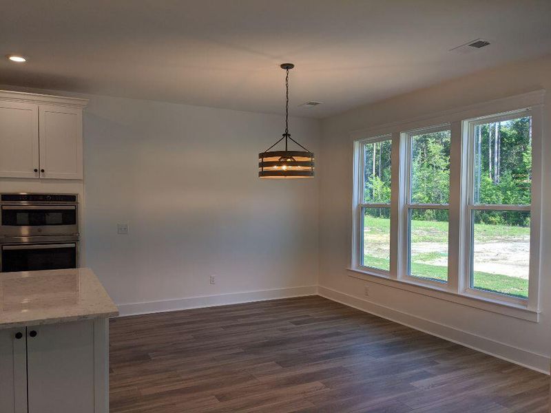 Spacious, unfurnished interior of a new home in The Enclave at French Quarter Creek, Huger (Image 9).
