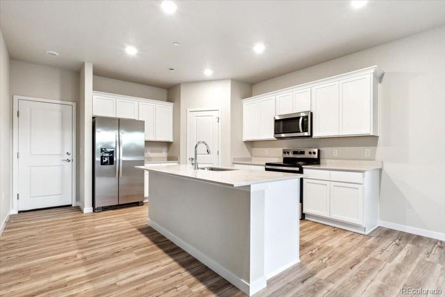 Furnished interior view inside a new home in Legato, Commerce City (Image 7).