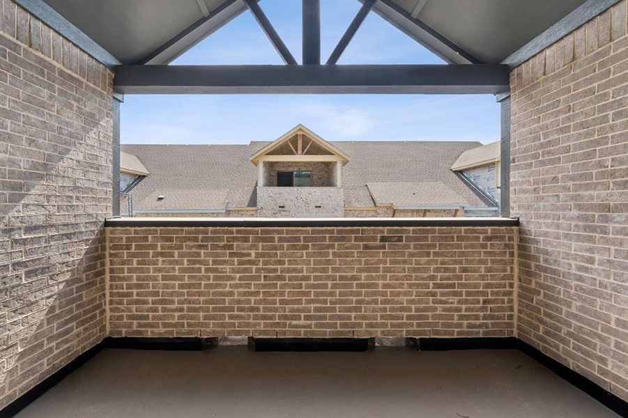 Exterior details and patio area of a home in Hillside at Las Colinas, Irving (Image 20).