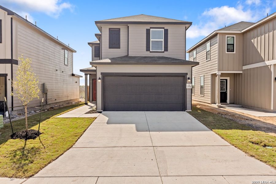 Front exterior of a new home in Preserve at Culebra - Villa Collection, San Antonio, TX, highlighting curb appeal (Image 20). Front exterior of a new home in Preserve at Culebra - Villa Collection, San Antonio, TX, highlighting curb appeal (Image 20).