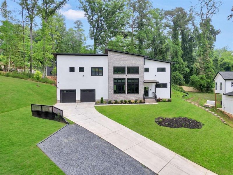 Front exterior of a new home in , Atlanta, GA, highlighting curb appeal (Image 26).