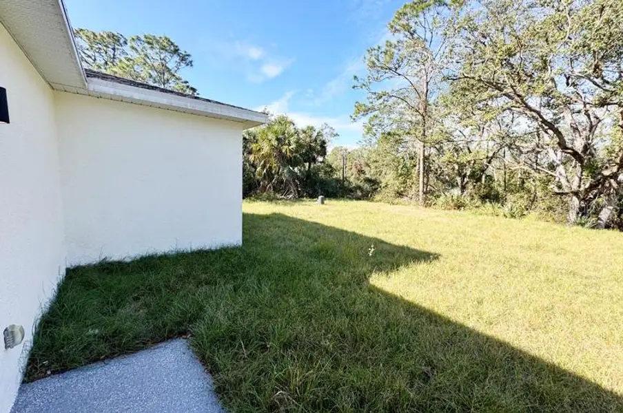 Exterior details and patio area of a home in , Port Charlotte (Image 3). Exterior details and patio area of a home in , Port Charlotte (Image 3).