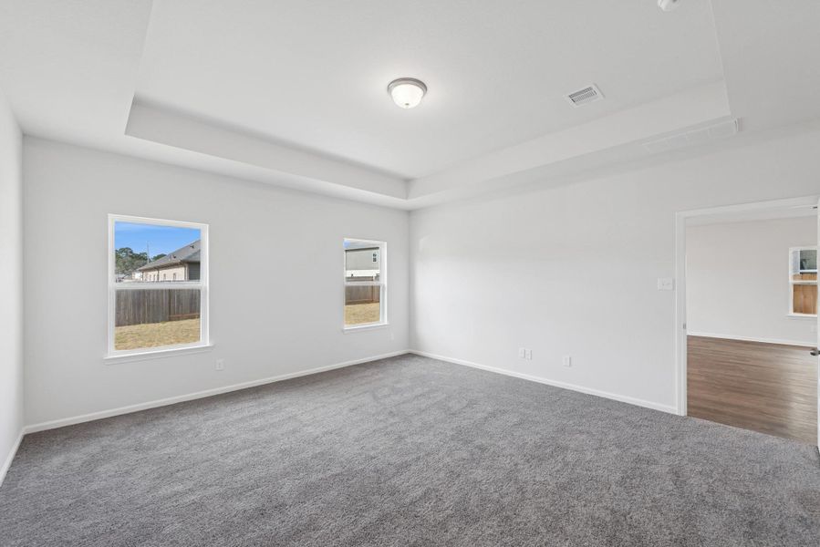 The Crawford- Primary Suite with Tray Ceiling The Crawford- Primary Suite with Tray Ceiling