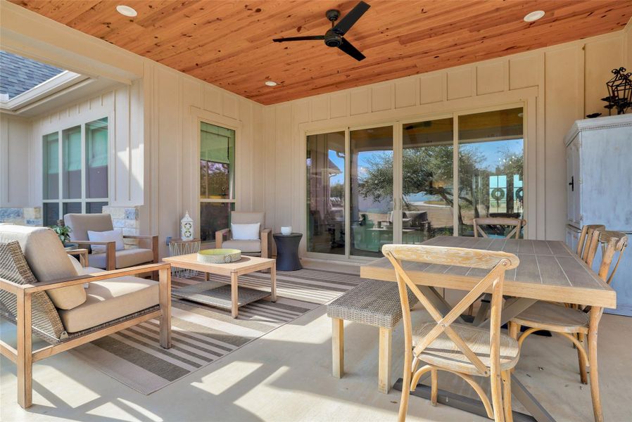 View of patio / terrace with a ceiling fan, outdoor dining area, and an outdoor living space