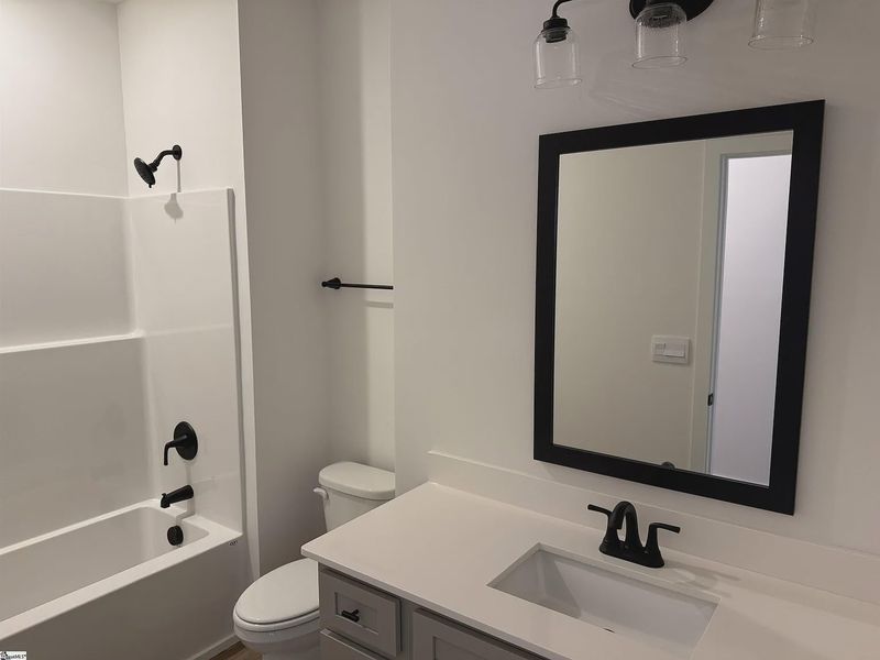 Furnished interior view inside a new home in Hidden Lake Estates, Greenville (Image 5).