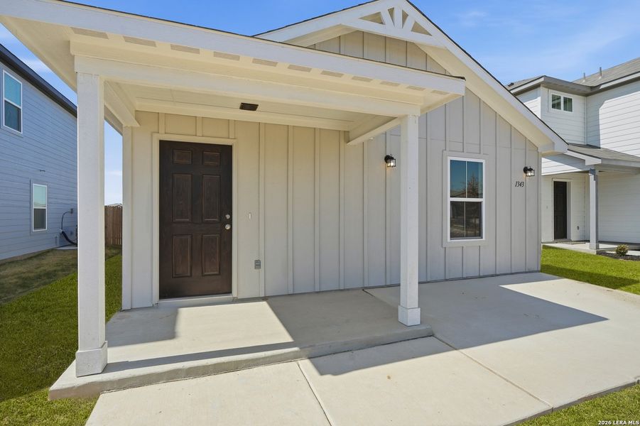 Exterior details and patio area of a home in Vista Real, Converse (Image 26).
