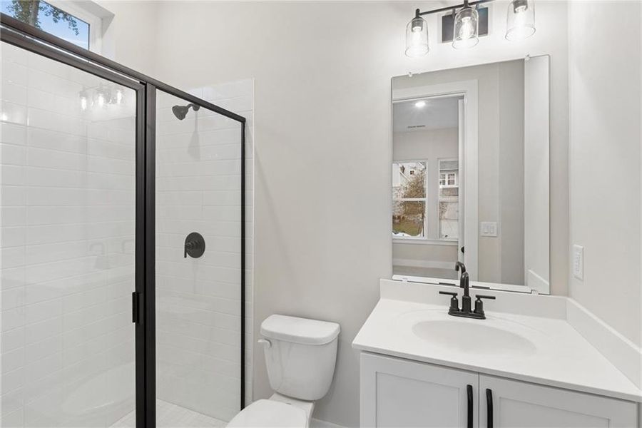 Furnished interior view inside a new home in Settingdown Farms, Cumming (Image 10).