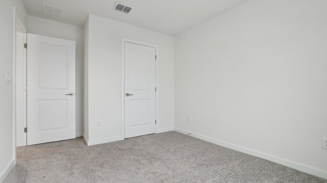 Secondary Bed of the Coronado - End at Cyrene at Harmony located in St Cloud FL by DRB Homes