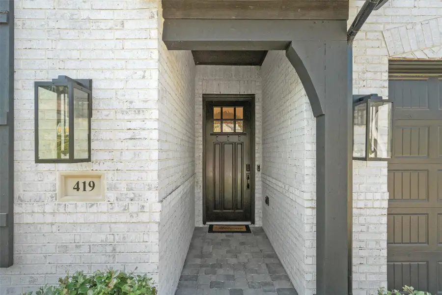 Front exterior of a new home in Woodforest, Montgomery, TX, highlighting curb appeal (Image 2). Front exterior of a new home in Woodforest, Montgomery, TX, highlighting curb appeal (Image 2).