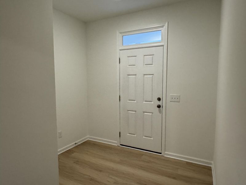 Spacious, unfurnished interior of a new home in East Main Townes, Spartanburg (Image 10).